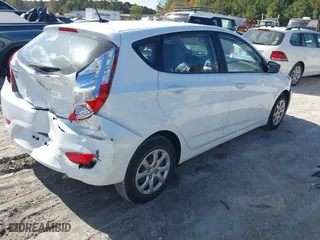 2014 Hyundai Accent GS with VIN KMHCT5AE9EU168274, listed as a IAAI auction lot 40737039 with 40,945 mi miles. Bid and sale history available at carsss.com. Image 4.