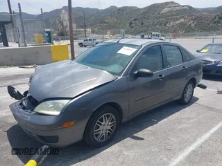 2007 Ford Focus S z VIN 1FAFP34N17W123378, wystawiony jako IAAI lot #42208033 z przebiegiem 183 803 mil mil oraz . Historia ofert i sprzedaży dostępna na DreamBid. Obrazek 18.