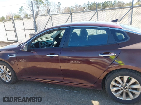 2017 Kia Optima LX with VIN 5XXGT4L33HG163285, listed as a IAAI auction lot 41802193 with 122,159 mi miles. Bid and sale history available at carsss.com. Image 14.