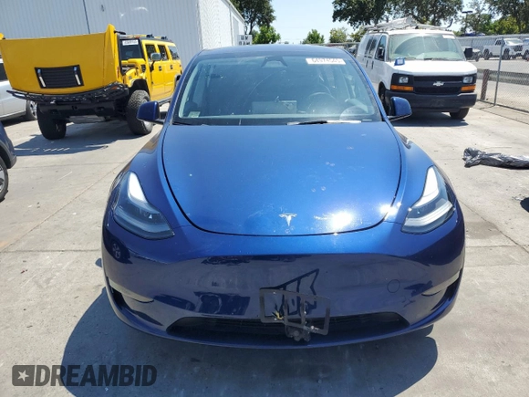 2024 Tesla Model Y z VIN 7SAYGDED9RF005104, wystawiony jako Copart lot #64974545 z przebiegiem 20 422 mil mil oraz Szkoda całkowita • Salvage title. Historia ofert i sprzedaży dostępna na DreamBid. Obrazek 5.