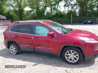 2016 Jeep Cherokee Latitude with VIN 1C4PJLCB8GW320099, listed as a IAAI auction lot 42236076 with 186,000 mi miles and . Bid and sale history available at DreamBid. Image 6.