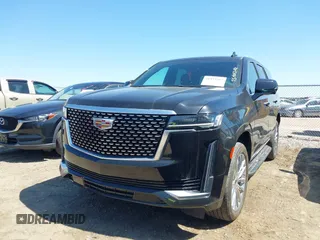 2023 Cadillac Escalade 4WD Premium Luxury with VIN 1GYS4BKL0PR409325, listed as a IAAI auction lot 41973567 with 32,398 mi miles and . Bid and sale history available at DreamBid. Image 17.