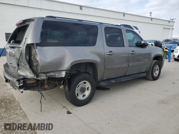 2012 Chevrolet Suburban LS with VIN 1GNWKLEG3CR308413, listed as a Copart auction lot 83671324 with 141,053 mi miles and Salvage title. Bid and sale history available at DreamBid. Image 3.