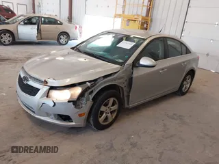 2014 Chevrolet Cruze 1LT with VIN 1G1PC5SB2E7296549, listed as a IAAI auction lot 42797744 with 137,343 mi miles and . Bid and sale history available at DreamBid. Image 2.