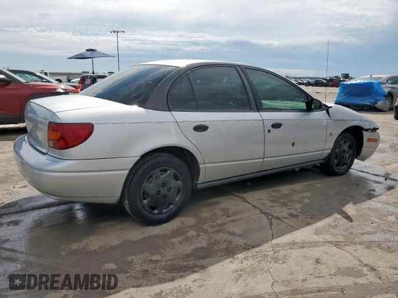 2002 Saturn SL с VIN 1G8ZH52892Z242469, выставлен на аукционе Copart как лот 59973755 с пробегом Не указан миль и Списание • Salvage title. История ставок и продаж доступна на DreamBid. Изображение 3.