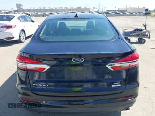 2020 Ford Fusion SE with VIN 3FA6P0HD8LR171120, listed as a IAAI auction lot 42004093 with 35,941 mi miles and . Bid and sale history available at DreamBid. Image 16.