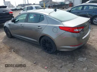 2012 Kia Optima SX with VIN 5XXGR4A62CG010028, listed as a IAAI auction lot 41942271 with 227,080 mi miles and . Bid and sale history available at carsss.com. Image 3.