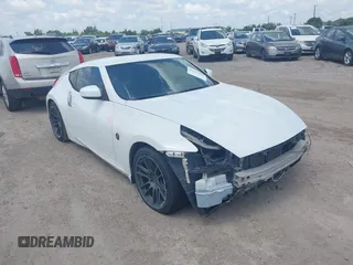 2012 Nissan 370Z z VIN JN1AZ4EH5CM564517, wystawiony jako IAAI lot #42385869 z przebiegiem 55 359 mil mil oraz . Historia ofert i sprzedaży dostępna na DreamBid. Obrazek 1.