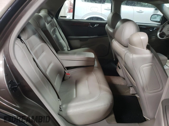 2003 Cadillac DeVille with VIN 1G6KD54Y43U124198, listed as a Copart auction lot 44515215 with 116,006 mi miles and Salvage Title. Bid and sale history available at carsss.com. Image 10.