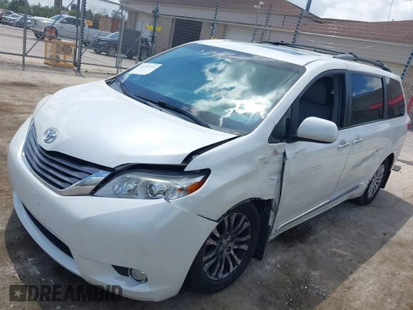2016 Toyota Sienna XLE with VIN 5TDYK3DC4GS702638, listed as a IAAI auction lot 42255793 with 124,977 mi miles and . Bid and sale history available at DreamBid. Image 2.