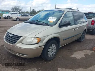 2006 Chrysler Town & Country SWB with VIN 1A4GP45R66B594898, listed as a IAAI auction lot 41128710 with 195,062 mi miles. Bid and sale history available at carsss.com. Image 18.