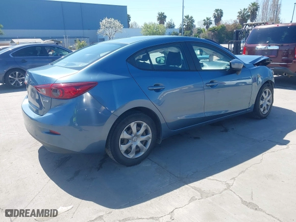 2014 Mazda Mazda3 i Sport with VIN JM1BM1U7XE1192670, listed as a IAAI auction lot 41991826 with 98,987 mi miles. Bid and sale history available at carsss.com. Image 4.