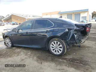 2020 Toyota Camry LE with VIN 4T1C11AK8LU916319, listed as a Copart auction lot 51277715 with 128,204 mi miles and Salvage Title. Bid and sale history available at carsss.com. Image 2.