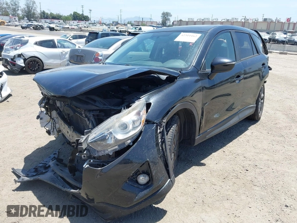 2016 Mazda CX-5 Grand Touring z VIN JM3KE2DY6G0900005, wystawiony jako IAAI lot #42311162 z przebiegiem 80 758 mil mil oraz . Historia ofert i sprzedaży dostępna na DreamBid. Obrazek 18.