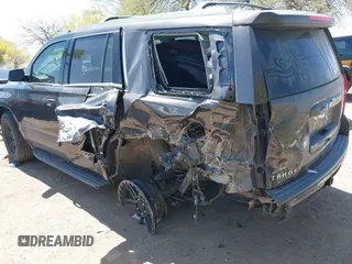 2017 Chevrolet Tahoe LS with VIN 1GNSCAKC3HR328833, listed as a IAAI auction lot 41993364 with 124,817 mi miles and . Bid and sale history available at DreamBid. Image 3.