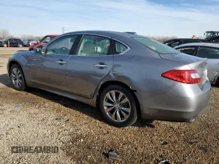 2014 Infiniti M37 with VIN JN1BY1AP2EM260051, listed as a Copart auction lot 87276884 with 101,899 mi miles and Salvage Title. Bid and sale history available at carsss.com. Image 2.