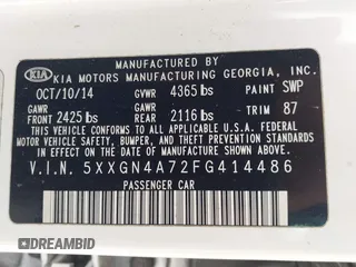 2015 Kia Optima EX with VIN 5XXGN4A72FG414486, listed as a IAAI auction lot 41870529 with 119,029 mi miles. Bid and sale history available at carsss.com. Image 9.