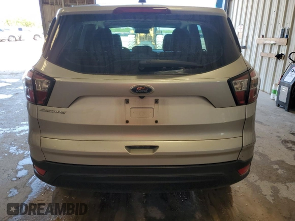 2018 Ford Escape S with VIN 1FMCU0F7XJUA09302, listed as a Copart auction lot 54260785 with 104,197 mi miles and Clean title. Bid and sale history available at DreamBid. Image 6.
