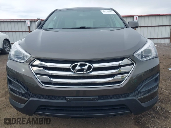 2014 Hyundai Santa Fe z VIN 5XYZTDLB1EG144290, wystawiony jako IAAI lot #42126367 z przebiegiem 138 525 mil mil oraz . Historia ofert i sprzedaży dostępna na DreamBid. Obrazek 6.