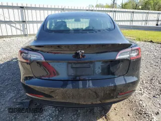 2022 Tesla Model 3 with VIN 5YJ3E1EAXNF286180, listed as a Copart auction lot 52299105 with 129,824 mi miles and Clean Title. Bid and sale history available at carsss.com. Image 6.