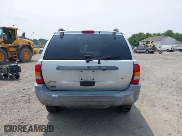 2002 Jeep Grand Cherokee Laredo with VIN 1J4GW48SX2C313093, listed as a IAAI auction lot 42446559 with 200,319 mi miles and . Bid and sale history available at DreamBid. Image 16.