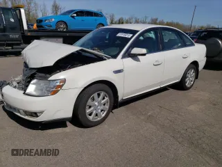 2009 Ford Taurus with VIN 1FAHP26W99G113459, listed as a Copart auction lot 51916015 with 165,674 mi miles and Salvage title. Bid and sale history available at DreamBid. Image 1.