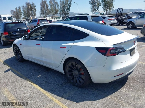 2022 Tesla Model 3 Performance with VIN 5YJ3E1EC2NF176127, listed as a IAAI auction lot 41807613 with 79,435 mi miles. Bid and sale history available at carsss.com. Image 3.