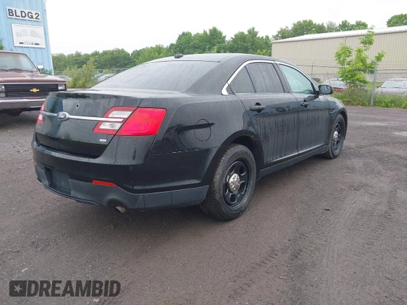 2014 Ford Police Interceptor with VIN 1FAHP2MK9EG101144, listed as a IAAI auction lot 42456061 with 160,659 mi miles and . Bid and sale history available at DreamBid. Image 4.