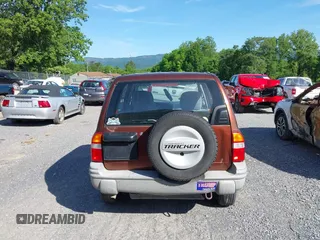 2000 Chevrolet Tracker z VIN 2CNBJ13C3Y6917675, wystawiony jako IAAI lot #42281654 z przebiegiem 153 805 mil mil oraz . Historia ofert i sprzedaży dostępna na DreamBid. Obrazek 17.