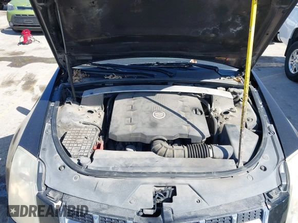 2012 Cadillac CTS with VIN 1G6DC1E36C0140661, listed as a IAAI auction lot 41968730 with 223,170 mi miles and . Bid and sale history available at DreamBid. Image 10.