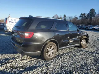 2015 Dodge Durango Citadel with VIN 1C4RDHEG2FC702604, listed as a Copart auction lot 82533594 with 135,798 mi miles and Salvage title. Bid and sale history available at DreamBid. Image 3.