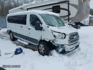 2018 Ford Transit Wagon XL with VIN 1FBZX2ZG2JKB04207, listed as a IAAI auction lot 41440996 with 126,256 mi miles. Bid and sale history available at carsss.com. Image 1.