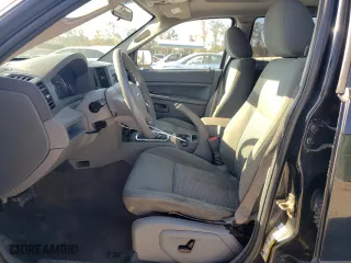 2007 Jeep Grand Cherokee Laredo with VIN 1J8HS48PX7C632012, listed as a Copart auction lot 77233144 with 189,890 mi miles and Clean Title. Bid and sale history available at carsss.com. Image 7.