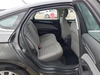 2016 Ford Fusion S z VIN 3FA6P0G72GR132394, wystawiony jako IAAI lot #42142780 z przebiegiem 66 013 mil mil oraz . Historia ofert i sprzedaży dostępna na DreamBid. Obrazek 8.
