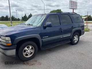 2002 Chevrolet Tahoe LS z VIN 1GNEC13Z92R180341, wystawiony jako Copart lot #59126715 z przebiegiem Nie podano mil oraz Czysty tytuł • Clean title. Historia ofert i sprzedaży dostępna na DreamBid. Obrazek 2.