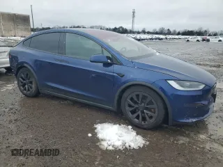 2023 Tesla Model X with VIN 7SAXCDE50PF430739, listed as a Copart auction lot 43069745 with 13,942 mi miles and Salvage Title. Bid and sale history available at DreamBid. Image 4.