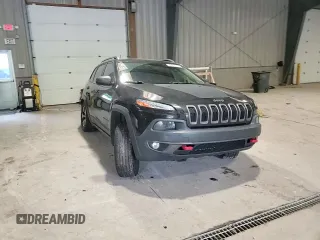 2016 Jeep Cherokee Trailhawk with VIN 1C4PJMBS4GW267375, listed as a Copart auction lot 58476005 with 116,151 mi miles and Salvage title. Bid and sale history available at DreamBid. Image 14.