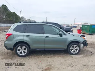 2016 Subaru Forester 2.5i Premium with VIN JF2SJADC0GH563577, listed as a IAAI auction lot 41694381 with 92,837 mi miles. Bid and sale history available at carsss.com. Image 14.