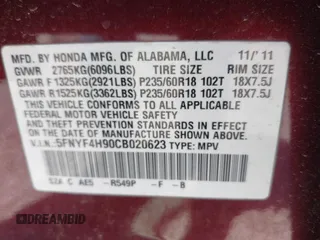 2012 Honda Pilot Touring with VIN 5FNYF4H90CB020623, listed as a IAAI auction lot 42048740 with 162,504 mi miles. Bid and sale history available at carsss.com. Image 9.