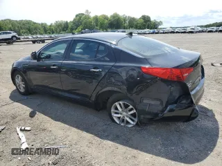 2013 Kia Optima LX z VIN 5XXGM4A75DG255625, wystawiony jako Copart lot #58465665 z przebiegiem 124 947 mil mil oraz Czysty tytuł • Clean title. Historia ofert i sprzedaży dostępna na DreamBid. Obrazek 2.