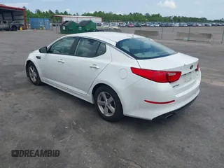 2015 Kia Optima LX with VIN 5XXGM4A71FG504439, listed as a IAAI auction lot 42470149 with 142,076 mi miles and . Bid and sale history available at DreamBid. Image 3.