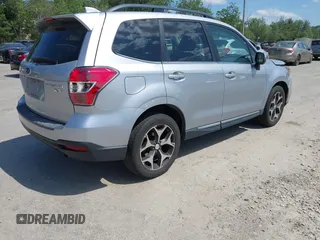 2016 Subaru Forester XT Touring with VIN JF2SJGVC9GH494261, listed as a IAAI auction lot 42560478 with 80,520 mi miles and . Bid and sale history available at DreamBid. Image 4.