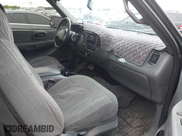 1999 Ford F-150 с VIN 1FTZX1728XKB68094, выставлен на аукционе IAAI как лот 41863108 с пробегом 219 109 миль миль и . История ставок и продаж доступна на DreamBid. Изображение 5.