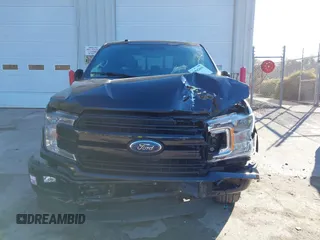 2018 Ford F-150 XL with VIN 1FTEW1EP7JFB77823, listed as a IAAI auction lot 40942694 with 163,078 mi miles. Bid and sale history available at carsss.com. Image 12.