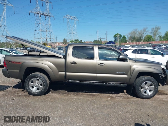 2015 Toyota Tacoma with VIN 3TMMU4FN5FM082376, listed as a IAAI auction lot 42144113 with 98,244 mi miles and . Bid and sale history available at DreamBid. Image 14.