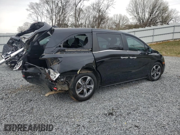 2019 Honda Odyssey Touring with VIN 5FNRL6H8XKB019879, listed as a Copart auction lot 48260545 with 164,233 mi miles and Salvage Title. Bid and sale history available at carsss.com. Image 3.