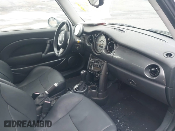 2005 MINI Hardtop with VIN WMWRC33535TJ70850, listed as a IAAI auction lot 42219720 with 66,398 mi miles and . Bid and sale history available at DreamBid. Image 5.