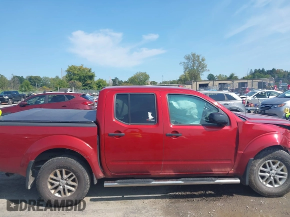 2015 Nissan Frontier Pro-4X with VIN 1N6AD0EV2FN721636, listed as a IAAI auction lot 40310184 with 132,897 mi miles and . Bid and sale history available at DreamBid. Image 13.