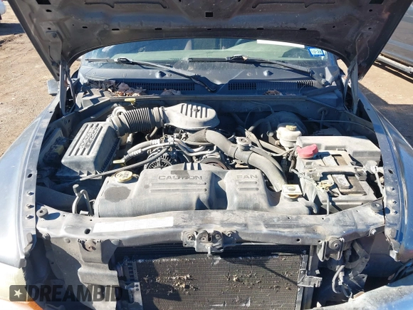 2003 Dodge Dakota SLT with VIN 1D7HL48X03S174569, listed as a IAAI auction lot 41159169 with 156,551 mi miles. Bid and sale history available at carsss.com. Image 10.