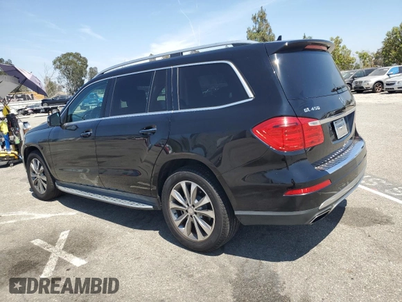 2015 Mercedes-Benz GL with VIN 4JGDF6EE4FA440695, listed as a Copart auction lot 58460214 with 130,161 mi miles and Salvage Title. Bid and sale history available at carsss.com. Image 2.